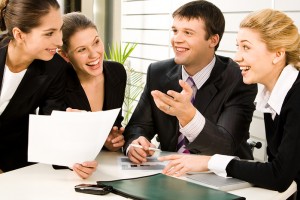 2014_79587407_3649429_bigstock_laughing_Discussing_Business_Plans_2547146-300x200